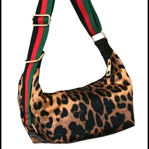 Ah.dorned messenger bag